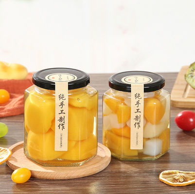 Flaches Hexagon-luftdichte Weckgläser, BPA geben Nahrungsmittelsicheres Glassüßigkeits-Glas mit Deckel frei fournisseur
