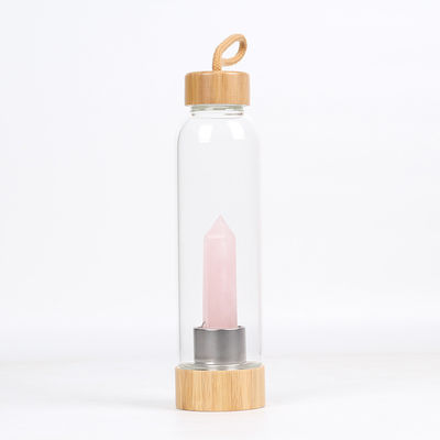 Wellness-heilender Edelstein-Glasflaschen für Wasser-Speicher, hineingegossene Rosenquarz-Kristall-Wasser-Flasche fournisseur